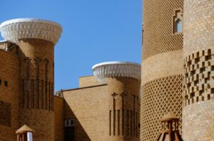 a building made of bricks with a sky background